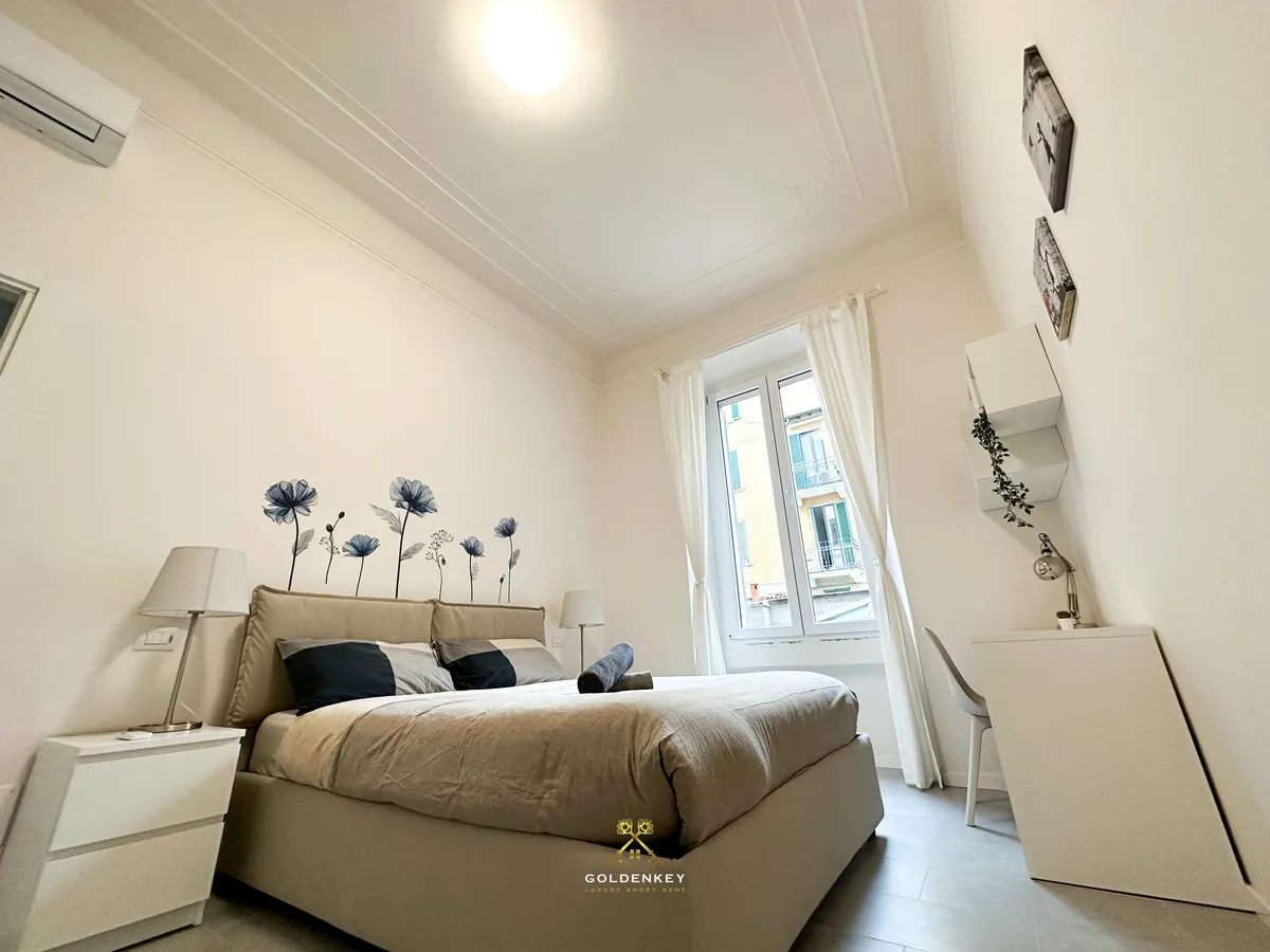 Zona notte elegante e luminosa